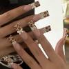imageBABALAL French Tip Press on Nails Long Square Fake Nails Brown Cheetah Glue on Nails 3d Bow Charm Design Acrylic Nails 24Pcs Squoval Manicure False Nails for Women and Girlsfneb106