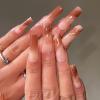 imageBABALAL Brown Press on Nails Medium Oval Fake Nails Fall Chrome Glue on Nails 24Pcs Cat Eye Shiny Round Acrylic Nails Manicure Stick on Nails for Women and GirlsNailB02brown
