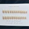 imageBABALAL Almond Press on Nails Medium Fake Nails White French Glue on Nails Black Star Rhinestones Acrylic Nails 24Pcs Stiletto False Nails for Women and GirlsFNf410white