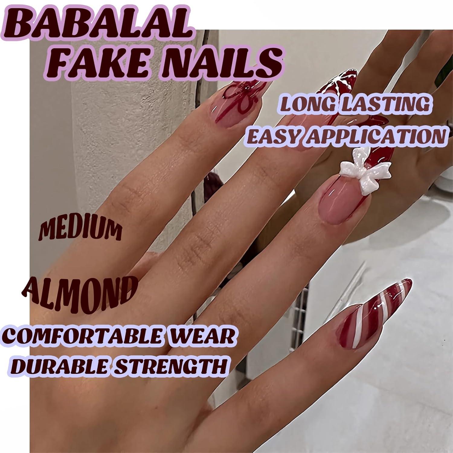 imageBABALAL Red Press on Fake Nails French Tip Design Acrylic Nails Medium Almond Shape Snowflake Candy Cane with Bow Charm Christmas Glossy 24pcs Reusable False Nails With Glue