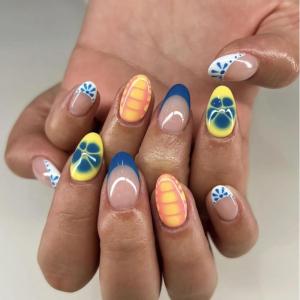 imageBABALAL Short Oval Press on Nails Cheetah Fake Nails French Tip Glue on with Star Y2k Design Fall Round Glossy Full Cover Acrylic False Nails ArtANU02flower