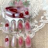 image:imageBABALAL Valentines Press on Nails Medium Almond  Red Glitter Fake Nails Sparkly Glossy Full Cover Acrylic Nails with Heart Branch Designs Reusable Glue on for Women 24PcsBNUA115