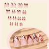 image:imageBABALAL Valentines Press on Nails Medium Almond  Red Glitter Fake Nails Sparkly Glossy Full Cover Acrylic Nails with Heart Branch Designs Reusable Glue on for Women 24PcsBNUA107